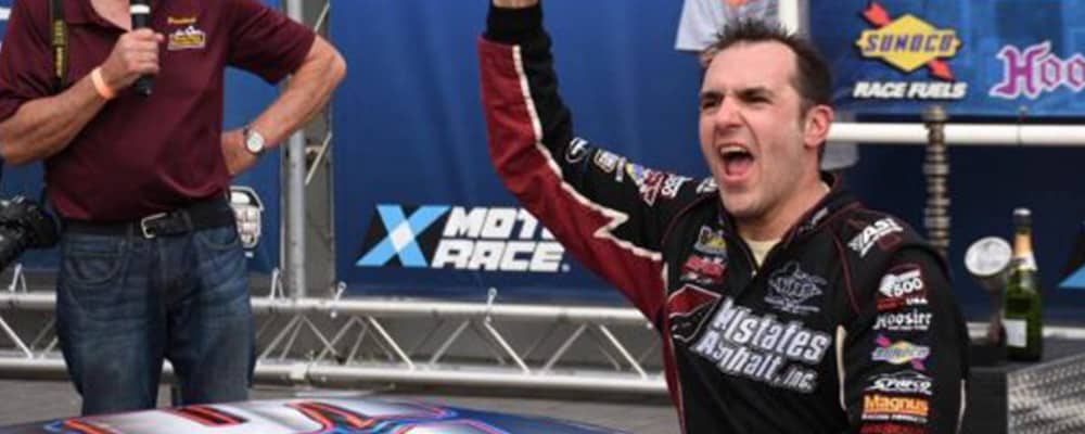 WOODY PITKAT CELEBRATES IN VICTORY LANE