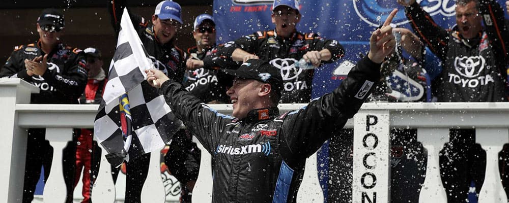 CHRISTOPHER BELL TAKES THE CHECKERED