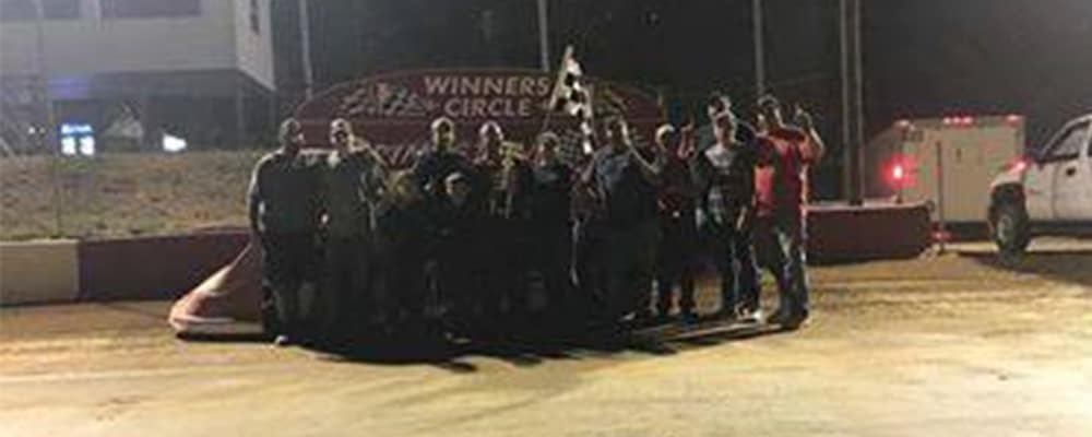T.J. SALANGO CELEBRATES IN WINNERS CIRCLE