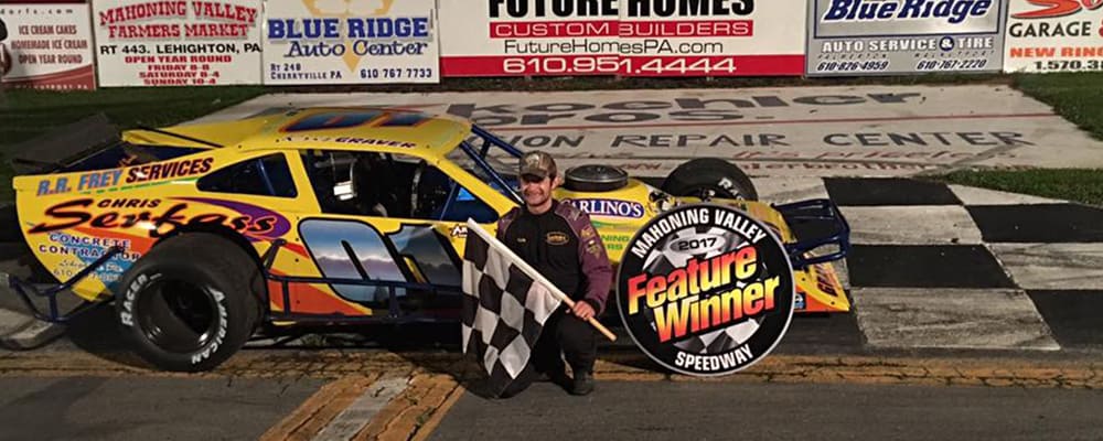 KRIS GRAVER TAKES THE CHECKERED