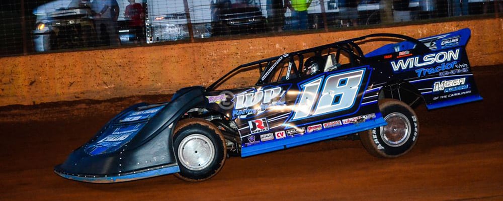 BRETT HAMM TAKES THE CHECKERED