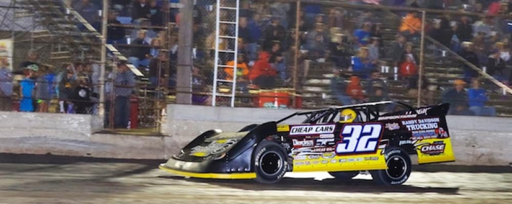 CHRIS SIMPSON TAKES THE CHECKERED