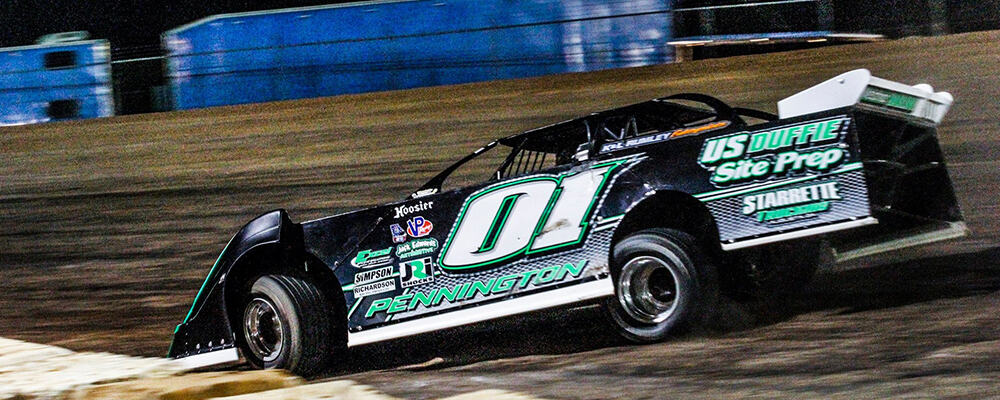TRAVIS PENNINGTON CAPTURES THE WIN